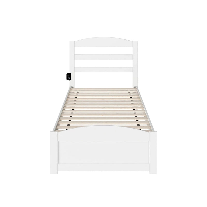 Lit plateforme en bois massif avec pied de lit
